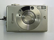 Pantvaror, 1 Kamera Ixus II med fjärrkontroll, i auktion: Pant – Lördag 9 augusti 2003