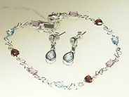 Smycken, ARMBAND, ÖRHÄNGEN silver med blå topaser, i auktion: Klassiska – Lördag 24 april 2004