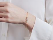 Smycken - ARMBAND, 18K guld med 6 topaser 4 briljantslipade diamanter 0,02 ctv - View 2