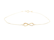 ARMBAND, 18K guld, vita stenar, evighetssymbol, längd 17,3 cm, vikt ca 0,9 g. på auktion i Stockholm, Stockholms län hos Kaplans Auktioner