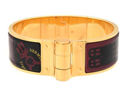 HERMÈS, ARMRING, Charniere Bracelet, svart, vinröd emalj, guldfärgat spänne, diameter ca 6 cm, bredd 2 cm, Made in France, smyckespåse, originalask, repa. Good Condition.