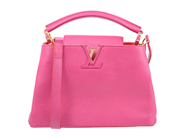 LOUIS VUITTON, VÄSKA, Capucines BB, Limited Edition Colored 2015, Taurillon läder, rosa. röd insida, guldfärga på auktion i Stockholm, Stockholms län hos Kaplans Auktioner