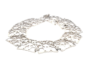 LIISA VITALI, armband, "Pitsi", sterlingsilver, genombrutet mönster, längd 19,5 cm, bredd 1,5 cm, vikt ca 10,8 på auktion i Stockholm, Stockholms län hos Kaplans Auktioner