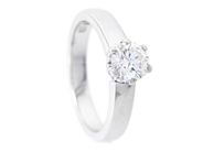 ENSTENSRING, 18K vitguld, briljantslipad diamant ca 0,63 ct, ca W(H)/VS2,  stl 16,25 mm, vikt 5,6 g.