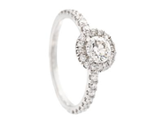 CARMOSÉRING, 18K vitguld, briljantslipade diamanter ca 0,72 ctv, ca 15,75 mm, vikt 3,0 g.