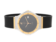 HUBLOT, Genève, MDM, Serie nr. 188637, Boett nr. S 152 10 2, herrur, 36 mm, stål/guld, quartz, safirglas, datu på auktion i Stockholm, Stockholms län hos Kaplans Auktioner