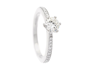 RING, 18K vitguld, briljantslipad diamant ca 0,50 ct, Cr(J)/VS1, 20 briljantslipade diamant ca 0,10 ctv W/SI, på auktion i Stockholm, Stockholms län hos Kaplans Auktioner