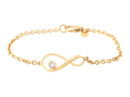 ARMBAND, 18K guld, 2 briljantslipade diamanter ca 0,30 ctv, ca TW/VS, längd 16,5 cm, vikt 6,4 g. på auktion i Stockholm, Stockholms län hos Kaplans Auktioner