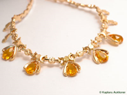 Pantvaror, Collier, med gula stenar 45,5cm 18K 31,5g, i auktion: Pant – Tisdag 21 februari 2006