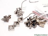 Pantvaror, Parti guld, defekter stenar saknas 18K 21,9 g, i auktion: Pant – Tisdag 30 maj 2006