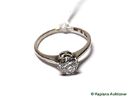 Pantvaror, 1 Ring 18K vg m dia (ca: 0,80 ct, P)  stl  16 1/4. Vikt 2,3g, i auktion: Pant – Lördag 17 februari 2007
