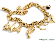 Pantvaror, Armbnad, 18K med 9 Berlocker, i auktion: Pant – Tisdag 17 juni 2008