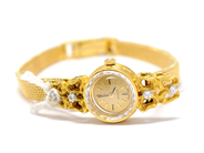 Pantvaror, Damur, Omega 18K  barkfinish, i auktion: Pant – Tisdag 1 februari 2011