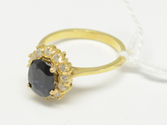 Pantvaror, Ring, med  blå sten och diamanter 12xca0,03ct Ø17 18K 4,2g, i auktion: Pant – Tisdag 22 november 2011