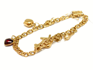 Pantvaror, Armband, Bismarck med 7 berlocker 19cm18K 12,6g, i auktion: Pant – Tisdag 22 november 2011