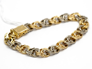Pantvaror, Armband Bismarck tvåfärgat 18K 19cm 40,6g, i auktion: Pant – Tisdag 31 juli 2012